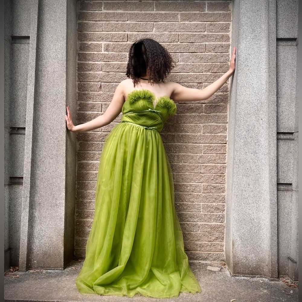 Green tulle floor length gown with slit